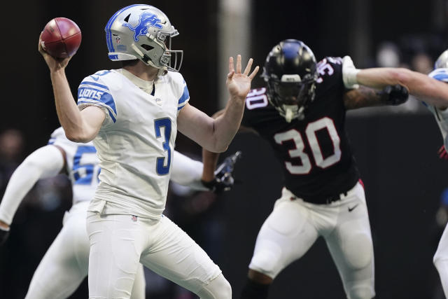 Detroit Lions punter Jack Fox (3) kicks off against the Seattle