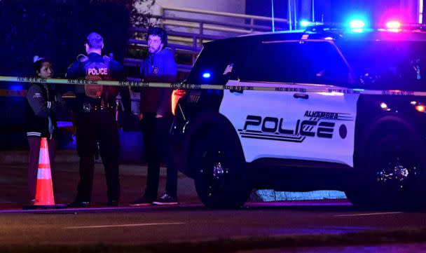 PHOTO: Police patrol the scene along Garvey Avenue in Monterey Park, California, on Jan. 21, 2023, where police are responding to reports of multiple people shot. (Frederic J. Brown/AFP via Getty Images)