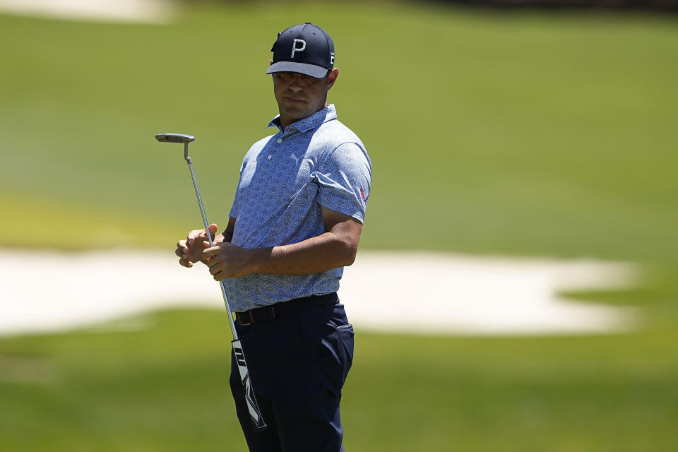 Gary Woodland watches his putt on the 16th hole during first round of the Wells Fargo Championship golf tournament at the Quail Hollow Club on Thursday, May 4, 2023, in Charlotte, N.C. (AP Photo/Chris Carlson)
