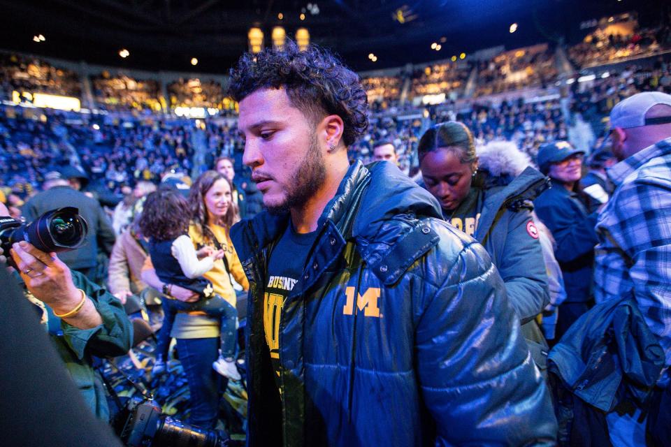 Michigan running back Blake Corum leaves the podium during the national championship celebration at Crisler Center in Ann Arbor on Saturday, Jan. 13, 2024.