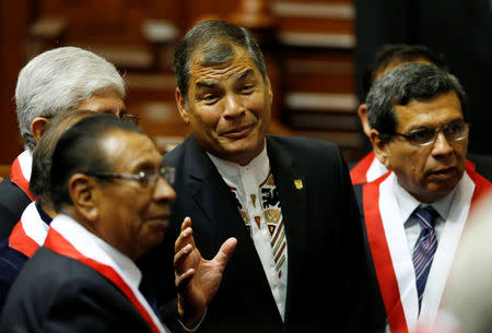 Ecuador's President Rafael Correa (C) talks with congress members before the inauguration of Peru's President-elect Pedro Pablo Kuczynski in Lima, July 28, 2016. REUTERS/Mariana Bazo