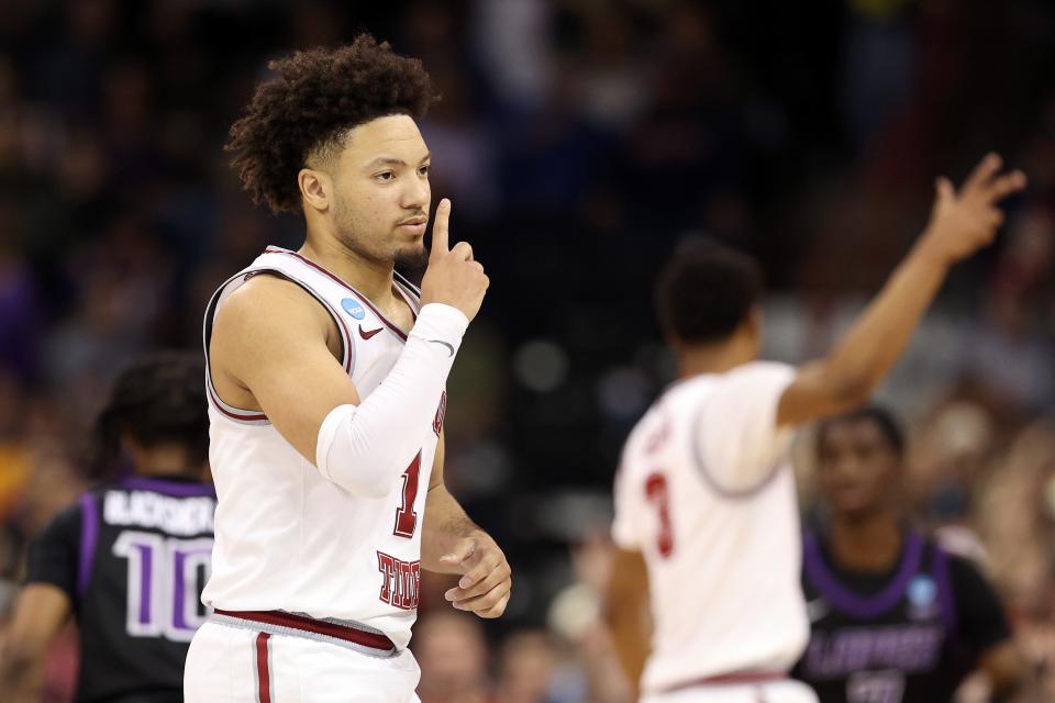 SPOKANE, WASHINGTON - MARCH 24: Mark Sears #1 of the Alabama Crimson Tide celebrates a three-point basket during the second half against the Grand Canyon Antelopes in the second round of the NCAA Men's Basketball Tournament at Spokane Veterans Memorial Arena on March 24, 2024 in Spokane, Washington. (Photo by Steph Chambers/Getty Images)