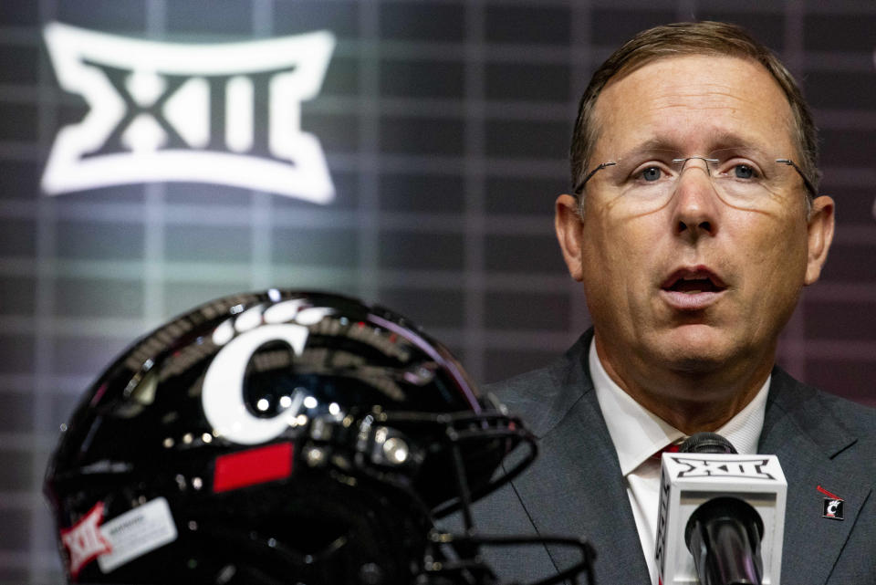 FILE - Cincinnati head football coach Scott Satterfield answers questions from reporters at the NCAA college football Big 12 media days in Arlington, Texas, Thursday, July 13, 2023. Cincinnati opens their season at home against Eastern Kentucky on Sept. 2.(AP Photo/Emil T. Lippe, File)