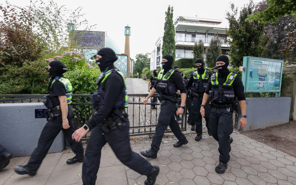 Police officers in balaclavas descended on the Imam Ali mosque on Wednesday morning