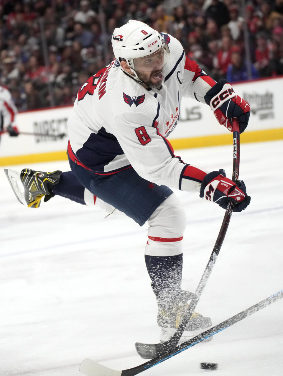 Washington Capitals left wing Alex Ovechkin puts a shot on net in the second period of an NHL hockey game against the Colorado Avalanche Tuesday, Jan. 24, 2023, in Denver. (AP Photo/David Zalubowski)