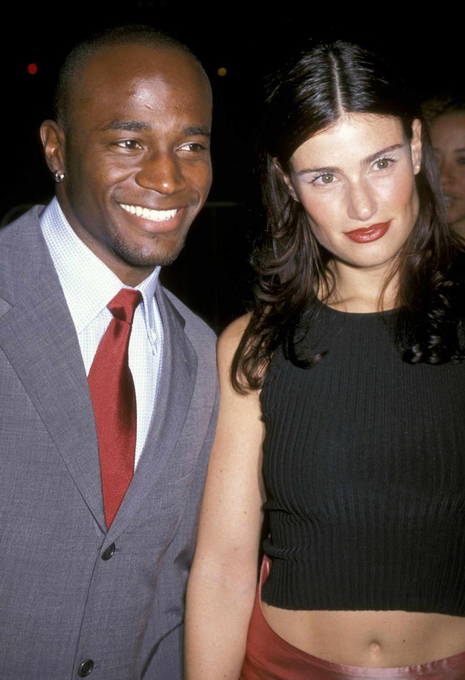 Taye Diggs and Idina Menzel during The Best Man Premiere at Cineplex Odeon Century Plaza Cinema in Century City, California, United States