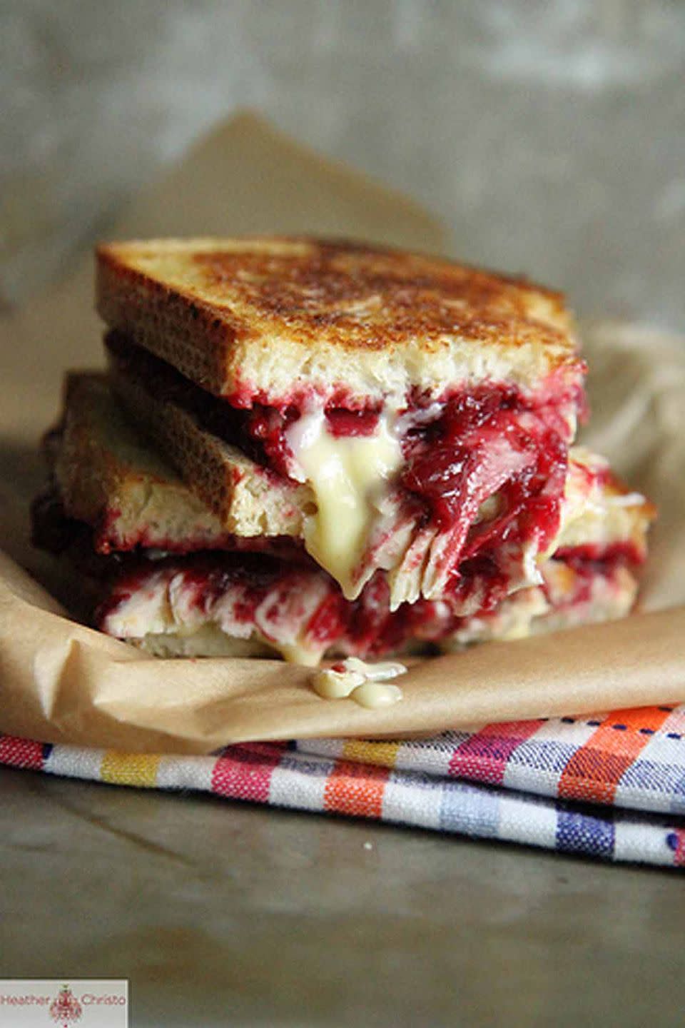 <p>What better way to use leftover turkey and cranberry sauce than grilling it with some savory brie cheese. YUM.</p><p><strong>Get the recipe at <a href="http://heatherchristo.com/2012/11/21/roasted-turkey-cranberry-and-brie-grilled-cheese/" rel="nofollow noopener" target="_blank" data-ylk="slk:Heather Christo.;elm:context_link;itc:0;sec:content-canvas" class="link ">Heather Christo.</a></strong> </p>