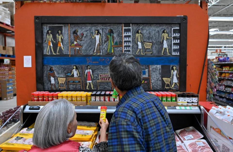 Scott Bolter, better known as Scott In Meat, has generated a following on social media for the chalk art he creates at WinCo Foods in Clovis. Drawings such as this Egyptian-themed piece above a case of meats change monthly.