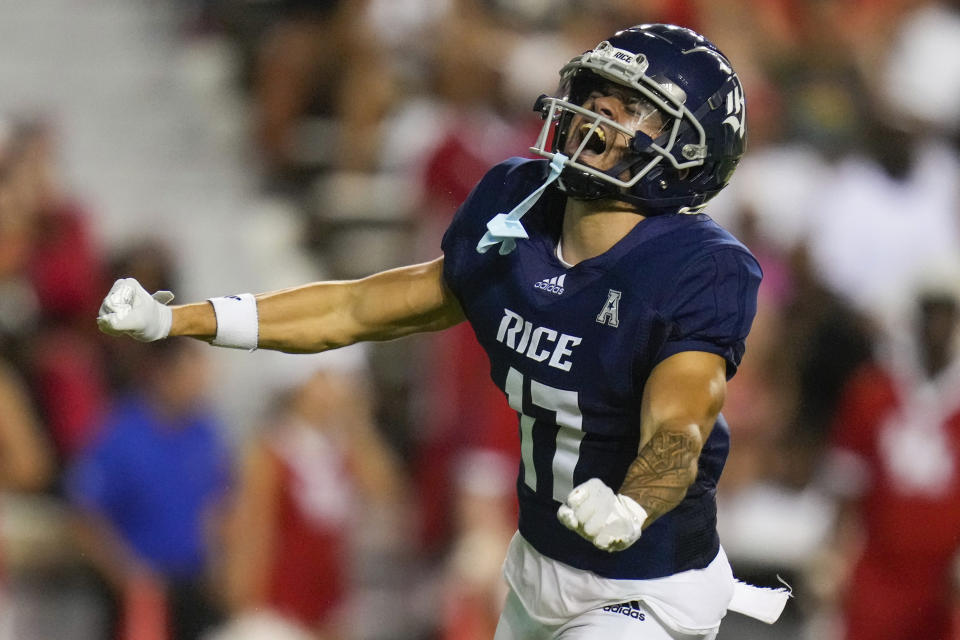 Rice safety Max Ahoia celebrates his tackle during the second half of an NCAA college football game against Houston, Saturday, Sept. 9, 2023, in Houston. (AP Photo/Eric Christian Smith)