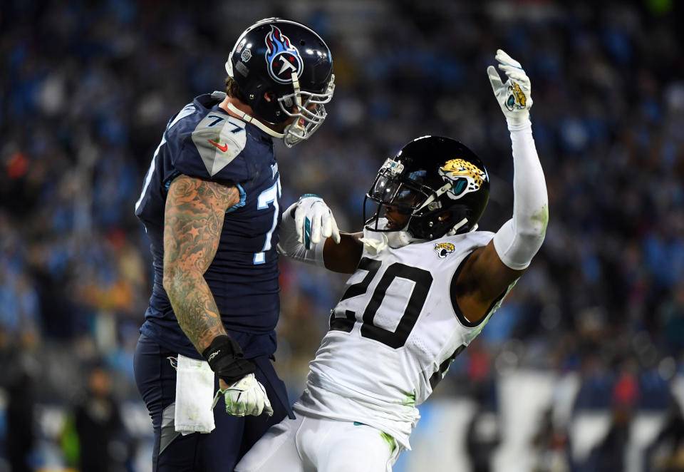 Taylor Lewan (left) and the Tennessee Titans are not to be messed with