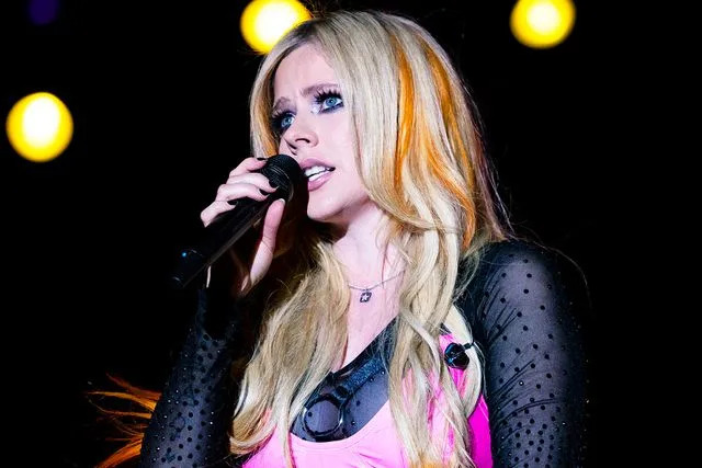 <p>Buda Mendes/Getty</p> Avril Lavigne performing in Rio de Janeiro in September 2022