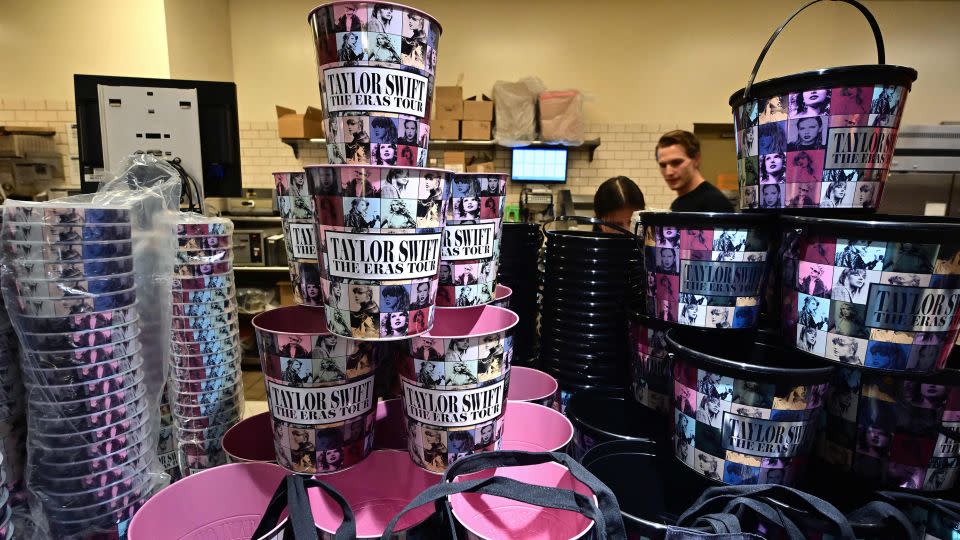 AMC's merchandise for "Taylor Swift: The Eras Tour" concert movie included exclusive popcorn containers. - Frederic J. Brown/AFP/Getty Images