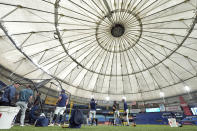 Tampa Bay Rays players take batting practice before a baseball game between the Rays and the Detroit Tigers Wednesday, April 24, 2024, at Tropicana Field in St. Petersburg, Fla. The future of the Tampa Bay Rays should come into clear focus in the coming weeks as the St. Petersburg City Council begins discussions about the $1.3 billion ballpark that would open for the 2028 baseball season. The stadium is the linchpin of a much larger project that would transform the downtown with affordable housing, a Black history museum, office and retail space. (AP Photo/Chris O'Meara)