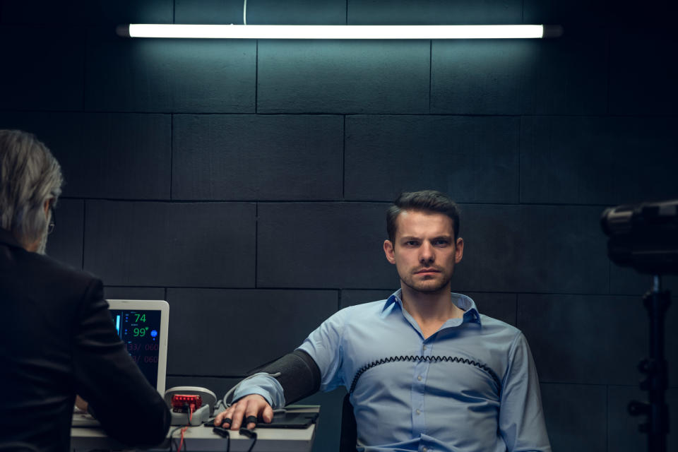 A man taking a polygraph test