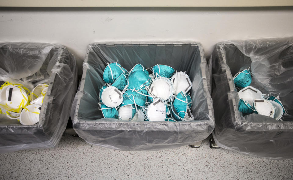 Used N95 masks are collected at Massachusetts General Hospital in Boston on April 13, 2020. Hospital staff wrote their names on their old masks so each can be returned to their original user to ensure the best fit. (Blake Nissen for The Boston Globe via Getty Images)