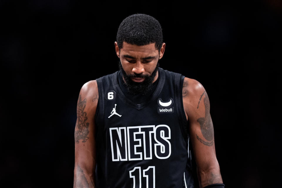 NEW YORK, NEW YORK - OCTOBER 31: Kyrie Irving #11 of the Brooklyn Nets walks to the bench during the second quarter of the game against the Indiana Pacers at Barclays Center on October 31, 2022 in New York City. NOTE TO USER: User expressly acknowledges and agrees that, by downloading and or using this photograph, User is consenting to the terms and conditions of the Getty Images License Agreement. (Photo by Dustin Satloff/Getty Images)