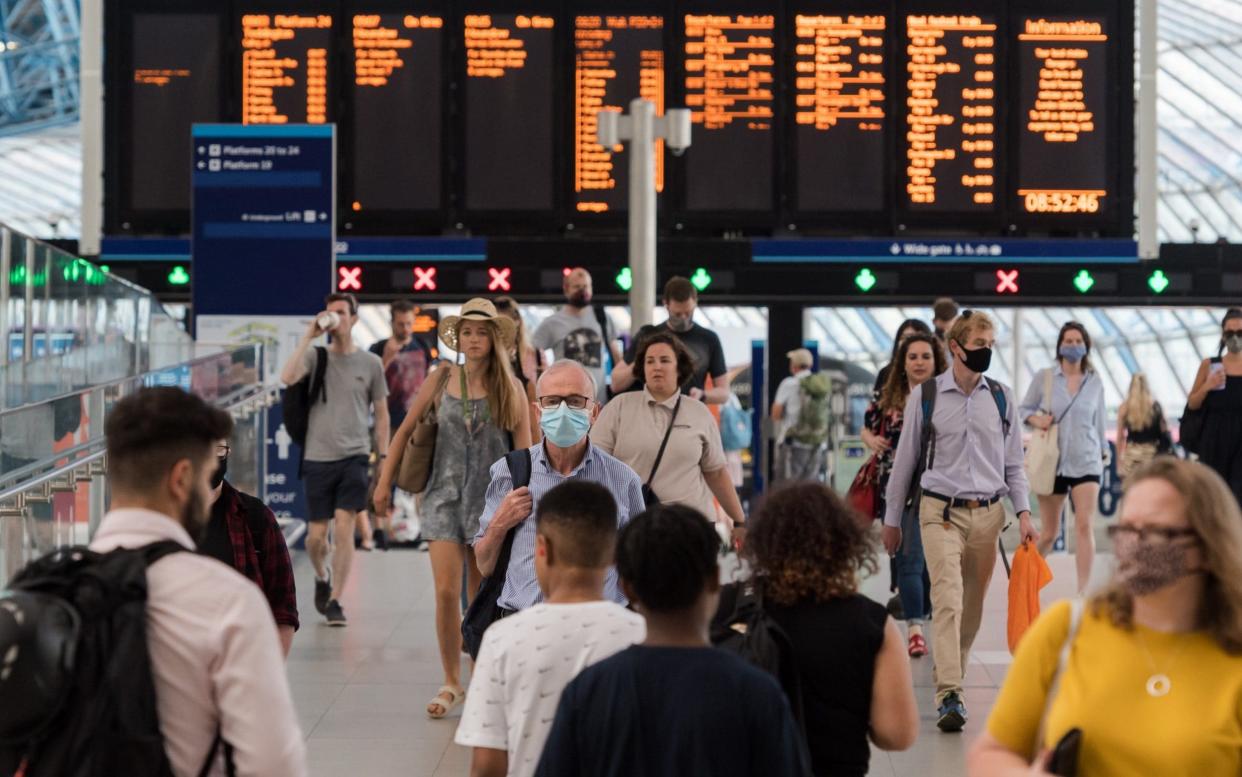 Commuters walk through Waterloo station in London - Wiktor Szymanowicz/Anadolu Agency via Getty Images