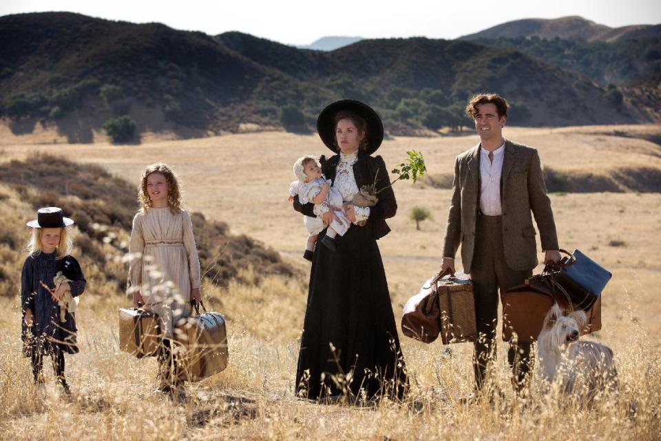 This image released by Disney shows, from left, Lily Bigham, Annie Buckley, Ruth Wilson, and Colin Farrell in a scene from "Saving Mr. Banks." (AP Photo/Disney, François Duhamel)