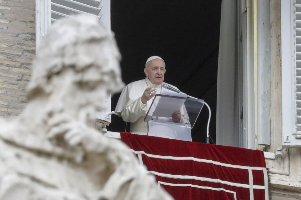 FILE - In this Dec. 8, 2020 file photo, Pope Francis delivers his message during the Angelus noon prayer from the window of his studio overlooking St.Peter's Square, on the Immaculate Conception day, at the Vatican. Pope Francis is once again canceling public appearances due to nerve pain. Francis will not participate in three events over the coming days “due to a recurrence of sciatica,” Vatican spokesman Matteo Bruni said in a statement on Saturday, Jan. 23, 2021. (AP Photo/Andrew Medichini, file)