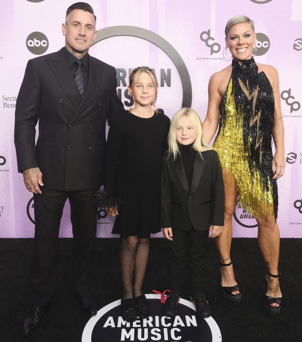 Carey Hart, Willow Sage Hart, Jameson Moon Hart, and P!nk attend the 2022 American Music Awards at Microsoft Theater on November 20, 2022 in Los Angeles, California