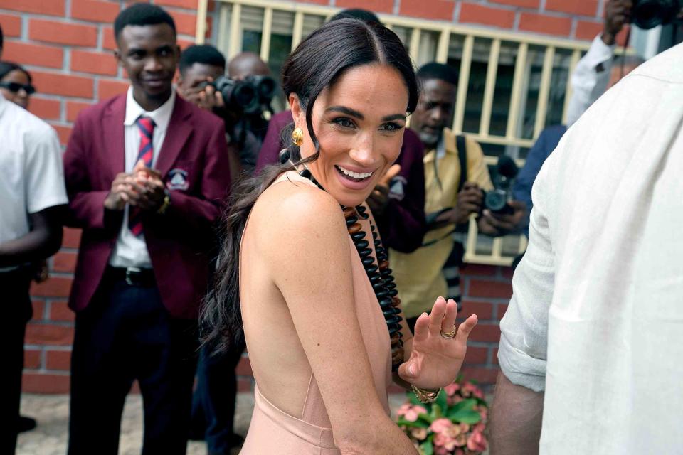 <p>AP Photo/Sunday Alamba</p> Meghan Markle in Abuja, Nigeria, Friday, May 10, 2024.