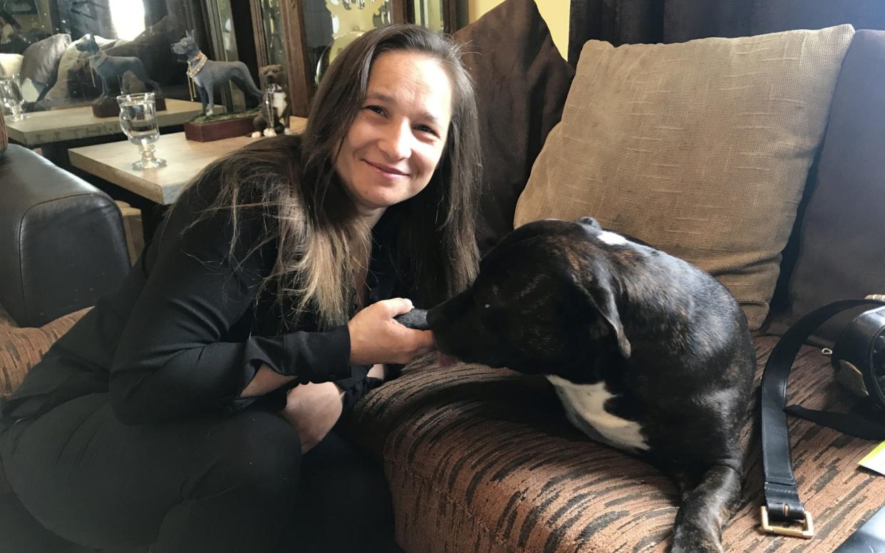 Irina Zureiqi tried to break up a fight between her Staffordshire bull terrier and another dog - KMG / SWNS.com