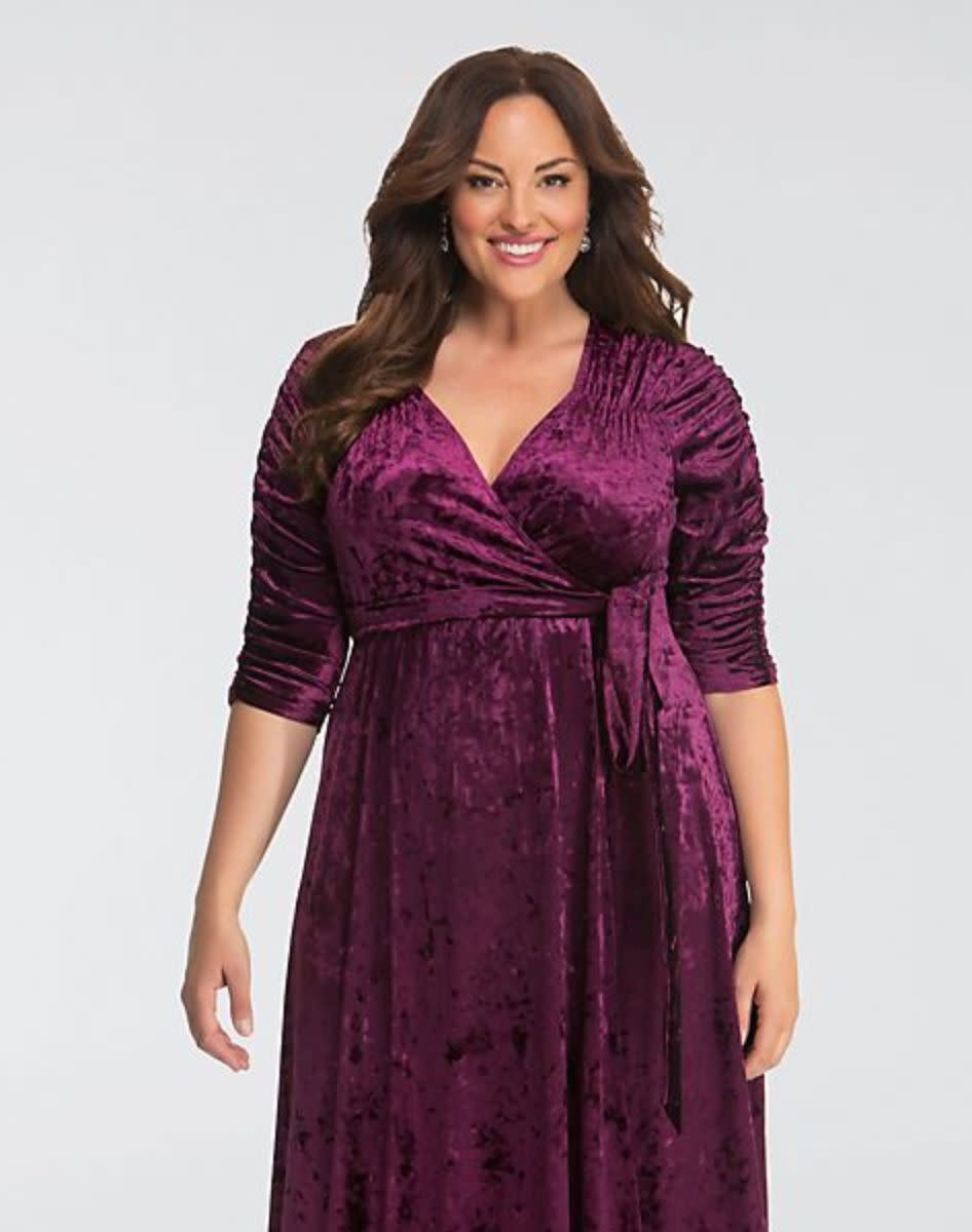 <i>Get the <a href="https://www.davidsbridal.com/Product_cara-velvet-plus-size-wrap-dress-13183002_velvet-dresses" target="_blank" rel="noopener noreferrer">David's Bridal Cara Velvet Plus Size Wrap Dress </a>for&nbsp;$148.</i>