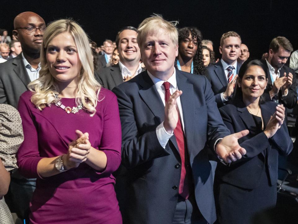 Miriam Cates with Boris Johnson at the Conservative Party conference this year: PA