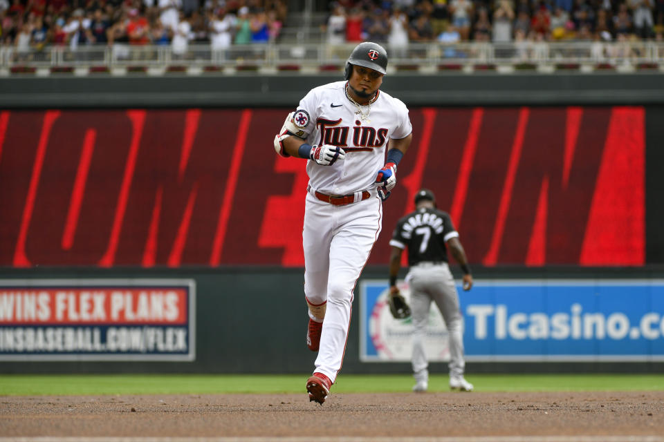 Minnesota Twins' Luis Arraez rounds the bases after hitting a solo home run against Chicago White Sox pitcher Lance Lynn during the first inning of a baseball game, Saturday, July 16, 2022, in Minneapolis. (AP Photo/Craig Lassig)