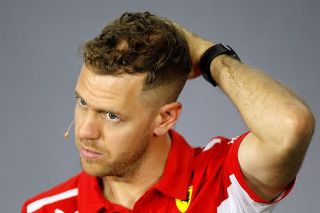 Formula One F1 - Australian Grand Prix - Melbourne Grand Prix Circuit, Melbourne, Australia - March 22, 2018 Ferrari's Sebastian Vettel during the press conference REUTERS/Brandon Malone