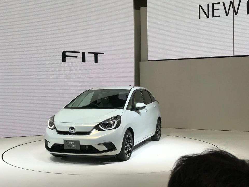 <p>The reveal of the <a href="https://www.caranddriver.com/news/a29247987/honda-fit-logo/" rel="nofollow noopener" target="_blank" data-ylk="slk:fourth-generation Honda Fit;elm:context_link;itc:0;sec:content-canvas" class="link ">fourth-generation Honda Fit</a> comes with both joy and concern. In the U.S., the current Honda Fit recently took a 17 percent dip in sales through September, being outsold by its HR-V crossover counterpart. We're happy with the way the <a href="https://www.caranddriver.com/news/a29555369/new-honda-fit/" rel="nofollow noopener" target="_blank" data-ylk="slk:new Fit;elm:context_link;itc:0;sec:content-canvas" class="link ">new Fit</a> looks, both inside and out. Honda has sharpened its already handsome subcompact hatchback looks without trading fashion for its functional spacious interior. Honda says a new hybrid powertrain is in the works for the global market, but company reps are still keeping their lips sealed about the car's future in the U.S. market.</p>