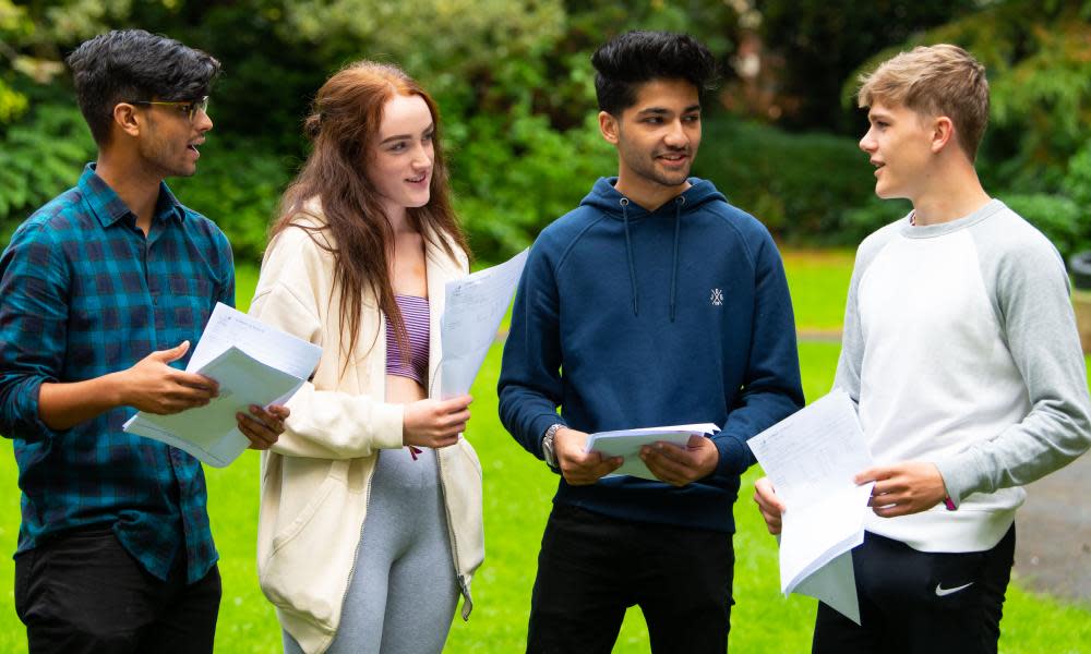 Students at Ffynone House school in Swansea discuss their A-level results. 