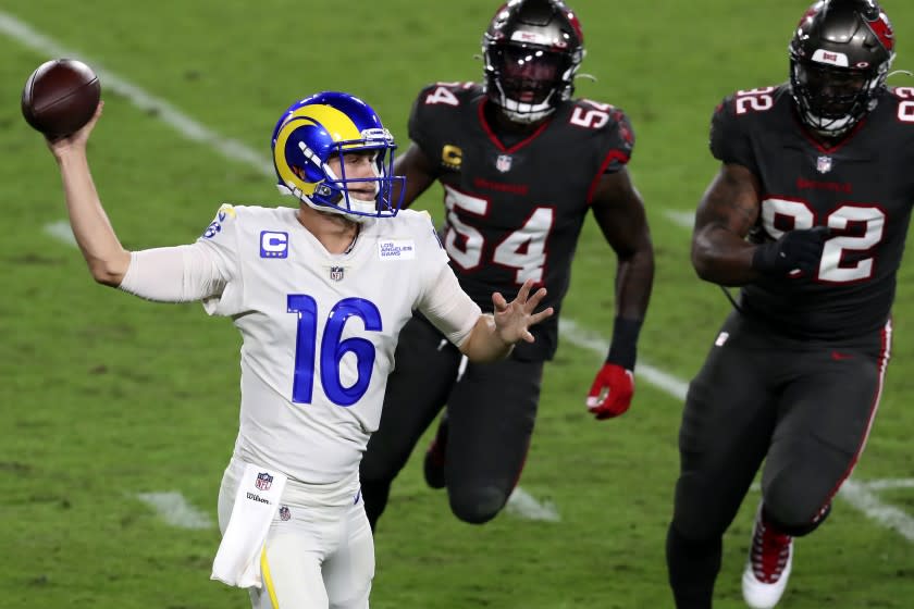 Los Angeles Rams quarterback Jared Goff (16) throws a pass as he is pressured by Tampa Bay Buccaneers.