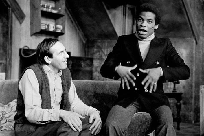 l-r: Leonard Rossiter (Rooksby), Don Warrington (Philip Smith) in THE BANANA BOX by Eric Chappell at the Hampstead Theatre Club, London NW3  17/05/1973      design: Adrian Vaux   lighting: Joe Davis   director: David Scase