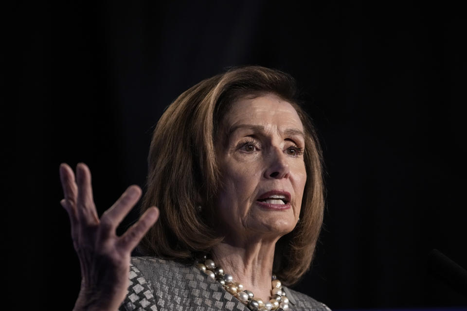 Speaker of the House Nancy Pelosi makes a point at the podium.