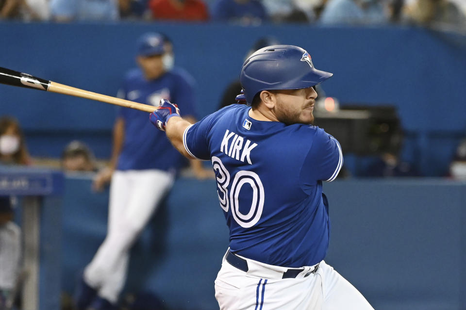 Toronto Blue Jays' Alejandro Kirk hits a single in the fourth inning of a baseball game against the Tampa Bay Rays in Toronto on Monday, Sept. 13, 2021. (Jon Blacker/The Canadian Press via AP)