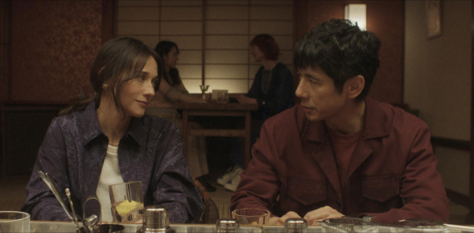 This image released by Apple TV+ shows Rashida Jones, left, and Hidetoshi Nishijima in a scene from "Sunny." (Apple TV+ via AP)