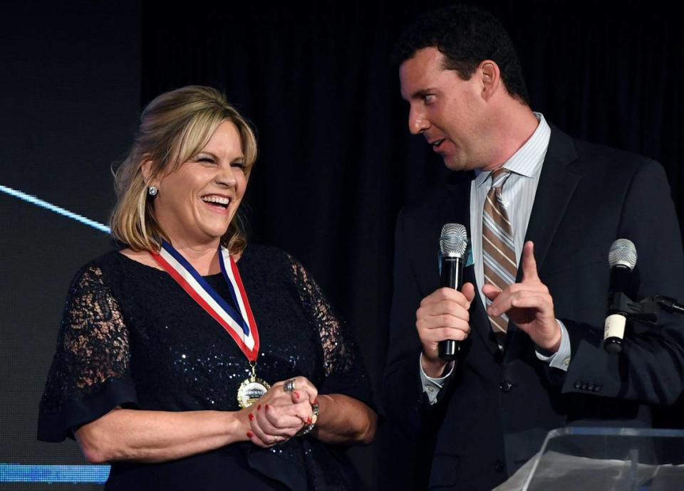 2022 inductee San Joaquin Memorial golfer Kathleen McCarthy, left, laughs as she’s interviewed by host Andrew Marden at the 63rd Annual Fresno County Athletic Hall of Fame Enshrinement Night Wednesday, Sept. 21, 2022 in Fresno. The event was also the grand opening in Athletic Hall of Fame’s new location inside the Save Mart Center at Fresno State.