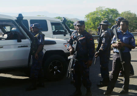 Heavily-armed Papua New Guinea police form a roadblock, preventing students from leaving the University of Papua New Guinea in Port Moresby, Papua New Guinea, June 8, 2016. PNGFM News / via REUTERS