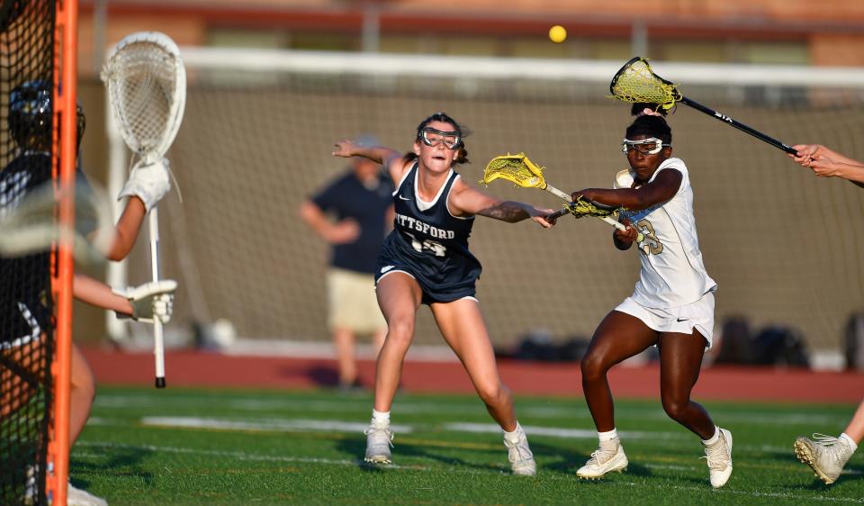 Lena Cox, right, is part of a balanced Rush-Henrietta offense.