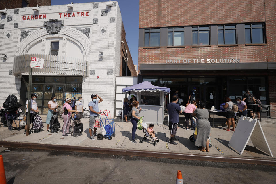 BRONX, NEW YORK - JULY 30: New Yorkers in need wait outside to receive food items from Part Of The Solution (POTS), one of Food Bank for NYC's partner pantries on July 30, 2021 in Bronx, New York. (Photo by Michael Loccisano/Getty Images for Food Bank For New York City)