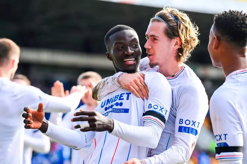 Rangers' Mohamed Diomande celebrates with Todd Cantwell