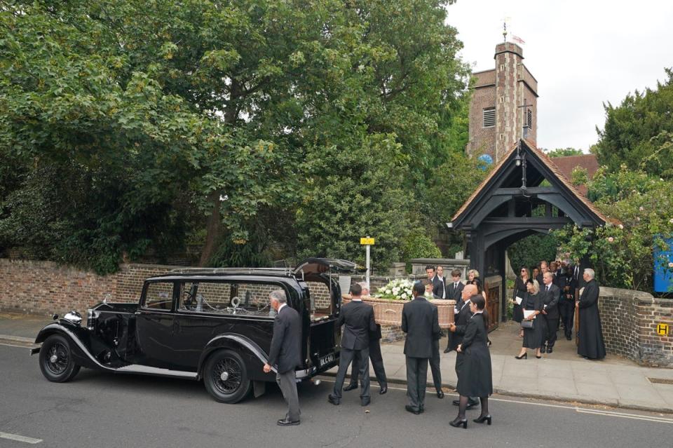 The coffin is carried out following the funeral service at St Mary’s Church in Barnes (Dominic Lipinski/PA) (PA Wire)