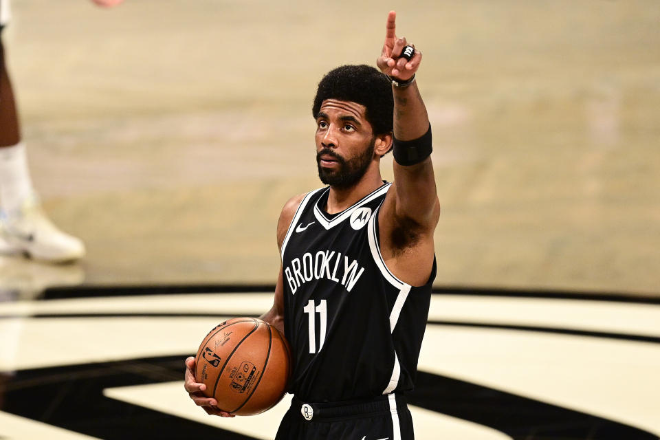 Brooklyn Nets star Kyrie Irving faces stiff financial penalties if he does not get vaccinated prior to the start of the NBA's regular season. (Steven Ryan/Getty Images)