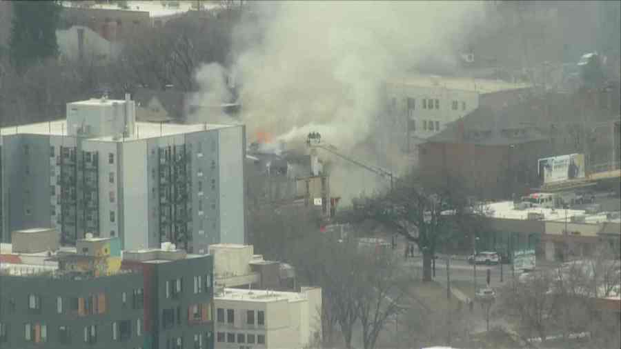 A large fire burning in a home at Colfax and Franklin Street