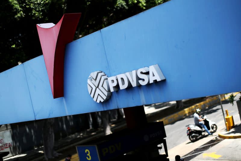 FILE PHOTO: A state oil company PDVSA's logo is seen at a gas station in Caracas