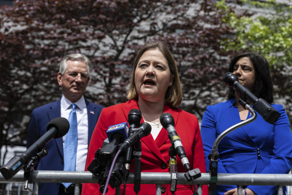 Iowa Attorney General Brenna Bird with Sen. Tommy Tuberville, R-Ala., left, and Rep. Nicole Malliotakis, R-N.Y., right, speaks at a press conference across the street from the Manhattan criminal court, Monday, May 13, 2024, in New York. (AP Photo/Stefan Jeremiah)