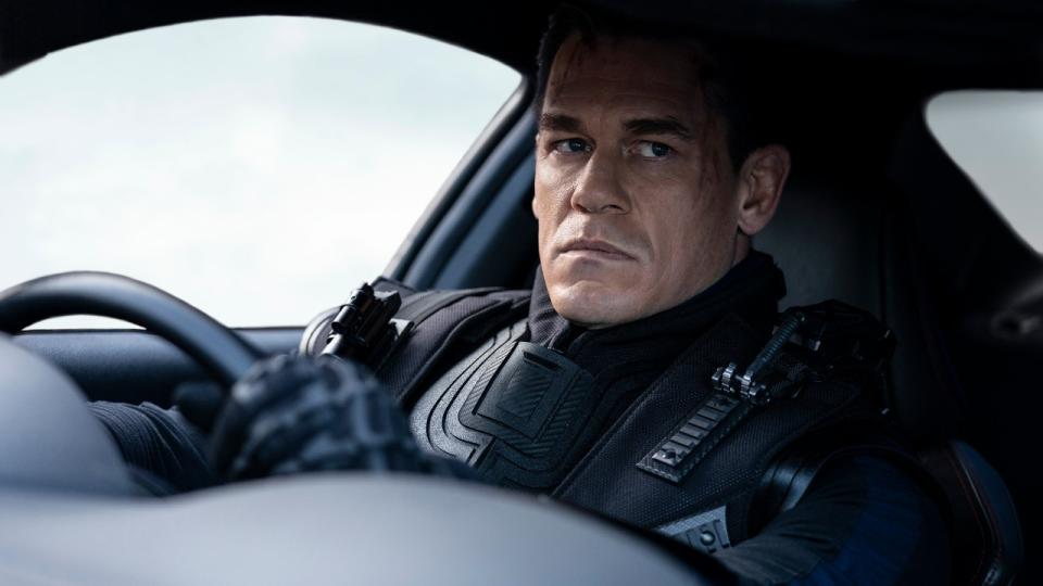 John Cena driving a car in F9.