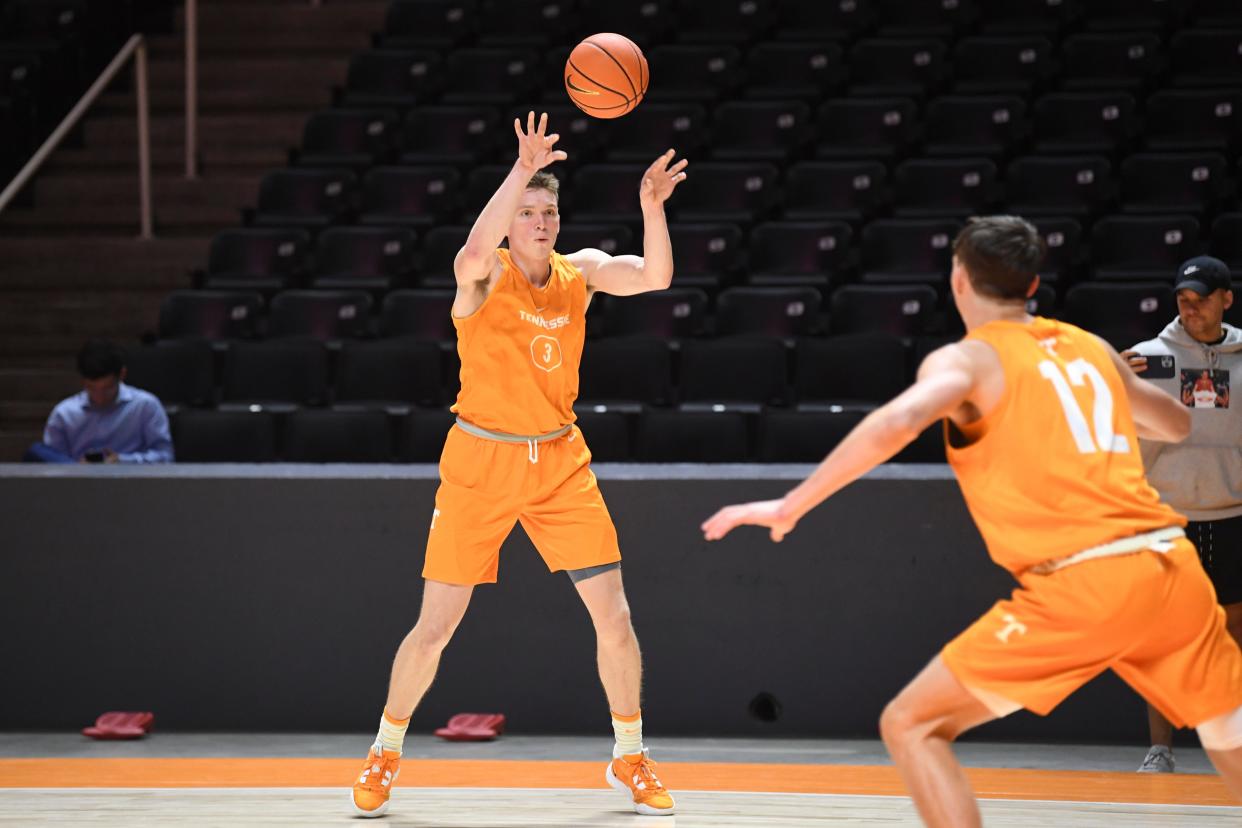 Tennessee guard Dalton Knecht (3) passes the ball during practice at Tennessee Basketball Media Day in the Food City Center, Tuesday, Oct. 3, 2023.
