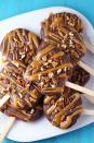 <p>This bite-size version of <a rel="nofollow noopener" href="https://www.womansday.com/food-recipes/food-drinks/g2573/how-to-make-caramel-apples/" target="_blank" data-ylk="slk:caramel apples;elm:context_link;itc:0;sec:content-canvas" class="link ">caramel apples</a> is the ultimate fall treat.</p><p><strong>Get the recipe at <a rel="nofollow noopener" href="http://www.momlovesbaking.com/chocolate-turtle-apple-slices/" target="_blank" data-ylk="slk:Mom Loves Baking;elm:context_link;itc:0;sec:content-canvas" class="link ">Mom Loves Baking</a>.</strong></p>